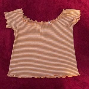 A cropped yellow and white shirt